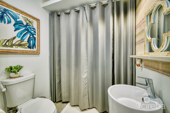 LIGHTHOUSE MANOR #6- CHIC 1-BEDROOM TOWNHOME IN GATED WEST BAY COMMUNITY