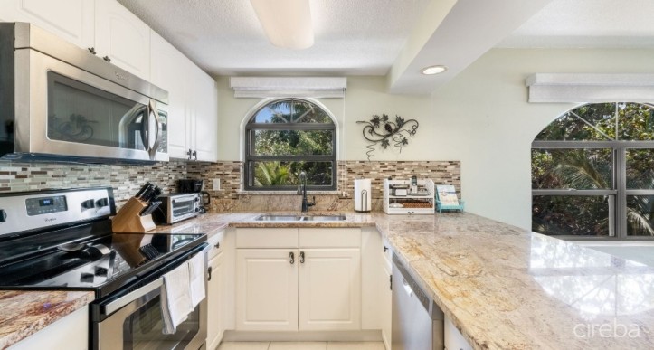 THE HERITAGE CLUB - SEVEN MILE BEACHFRONT CONDO