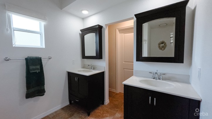 LITTLE CAYMAN OCEAN VIEW RESIDENTIAL HOME WITH BEACHFRONT LOT