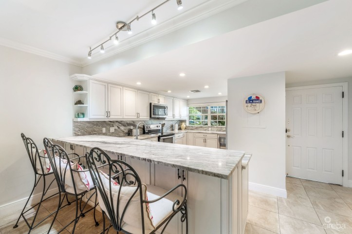 BRITANNIA LIONS COURT  UNIT #213 - RENOVATED 1-BEDROOM GARDEN VIEW CONDO