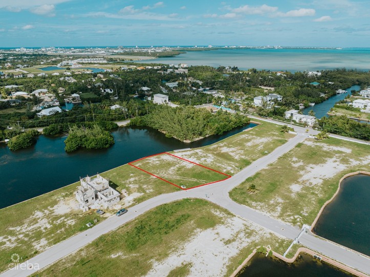 LARGEST LOT IN MUSTIQUE COVE - 0.31 ACRE CANAL LOT