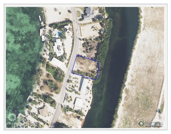 CAYMAN KAI CANAL FRONT LOT W/ APPROVED PLANS - WATER CAY ROAD