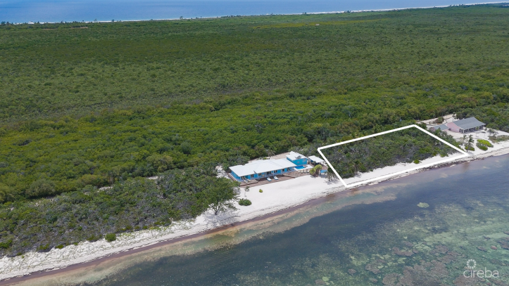 LITTLE CAYMAN BEACHFRONT HOME WITH 2 LOTS AND POOL