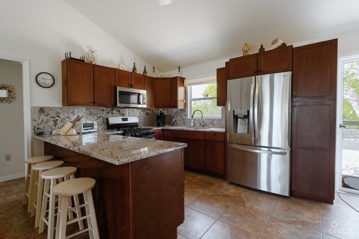 LITTLE CAYMAN OCEAN VIEW RESIDENTIAL HOME WITH BEACHFRONT LOT