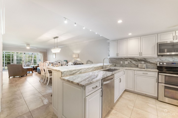 BRITANNIA LIONS COURT  UNIT #213 - 1-BEDROOM GARDEN VIEW CONDO