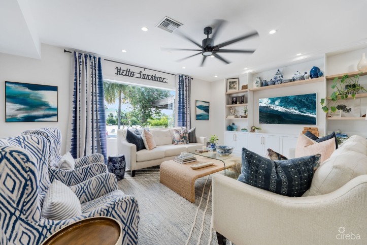 FULLY RENOVATED 4-BED CANAL FRONT HOME WITH DEN & DOCK | THE SHORES