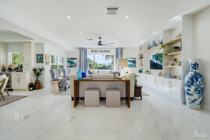 FULLY RENOVATED 4-BED CANAL FRONT HOME WITH DEN & DOCK | THE SHORES