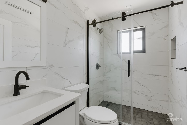 KINGSLEY TOWNHOMES 2 BED PLUS DEN UNIT 2.