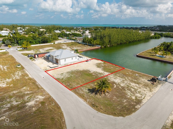 0.24 ACRE CANAL LOT IN GATED COMMUNITY - MUSTIQUE COVE