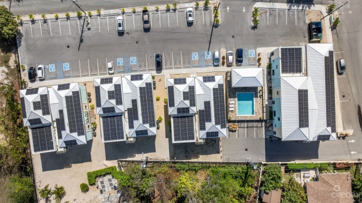 INCOME-PRODUCING RESIDENTIAL PORTFOLIO --4 STUDIOS IN WEST BAY