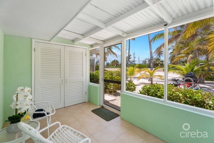 CAYMAN KAI SEA LODGE #13 BEACHFRONT CONDO WITH IMPRESSIVE RENTAL HISTORY