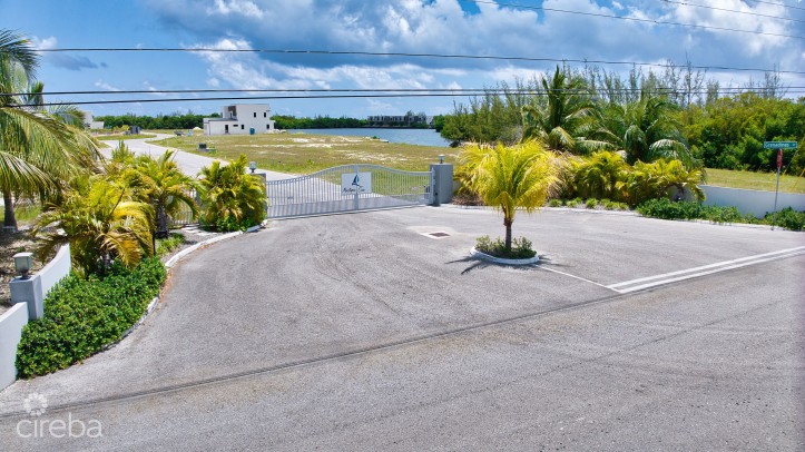 MUSTIQUE COVE LOT WITH DOCK IN A PRIVATE GATED COMMUNITY