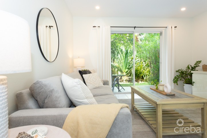 TURNKEY 2BED PLUS DEN END UNIT TROPICAL HAVEN